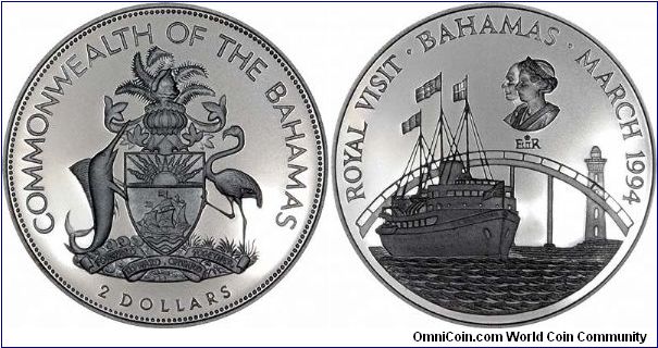 The Royal Yacht, S.S. Britannia shown with a bridge / causeway and lighthouse in the background, on a silver proof $2. Part of a 6-coin set issued to commemorate the Royal Visit of Queen Elizabeth II & Prince Philip to the Caribbean.