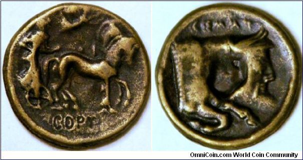 anyone recognize? reproduction coin with horse and chariot on one side and a bull on other side, 24 mm