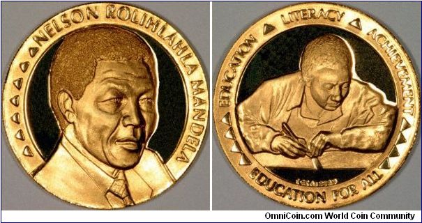 Nelson Mandela is featured on this South African one ounce fine (.9999) gold medallion, apparently issued in 1995. On the reverse, A young male student, possibly supposed to be Nelson himself, at his books, with the legend:
EDUCATION LITERACY ACHIEVEMENT 
EDUCATION FOR ALL.