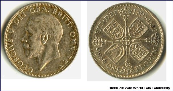 A Florin of 1936. On the reverse the coat of arms of Scotland, Ireland and twice of England. For some bizarre reason Florins have my favorite reverse design.