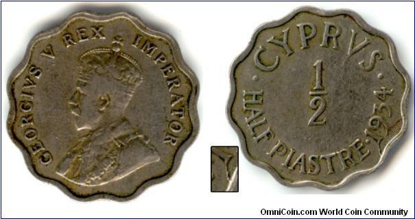 A second half piastre coin from 1934 Cyprus with a die break around the digit 1.