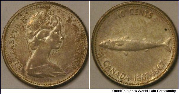 10 cents, Canada centennial wih fish (salmon?), 18 mm, 50% Ag