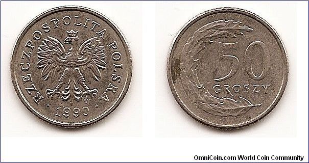 50 Groszy
Y#281
3.9400 g., Copper-Nickel, 20.5 mm. Obv: National arms Obv.
Leg.: RZECZPOSPOLITA POLSKA Rev: Value to right of sprig
Edge: Reeded