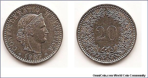 20 Rappen
KM#29a
4.2000 g., Copper-Nickel, 21 mm. Obv: Crowned head right Rev:
Value within wreath Edge: Plain