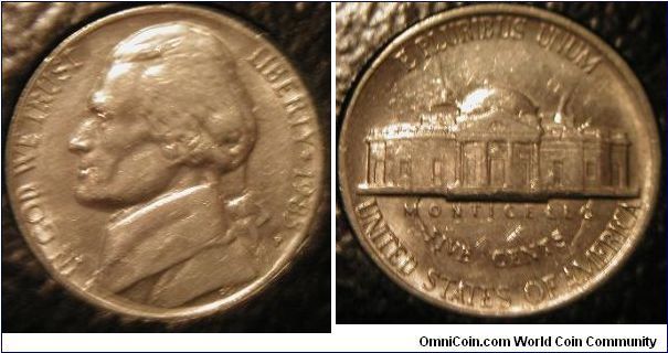 Error:

Unusually strong die clash on a  1983 Jefferson nickel. Notice, above and below Monticello, an upside-down inverted view of Jefferson can clearly be seen.

Found in a bank roll.

The obverse picture is blurry, but the reverse is the most important anyway.