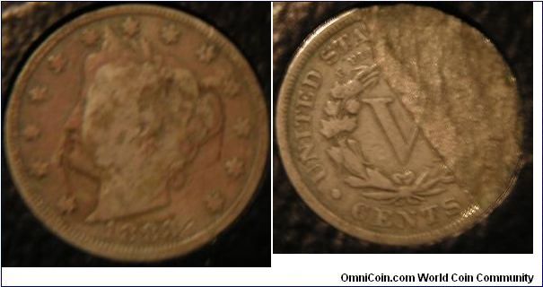 Error:

1883 'CENTS' V-nickel or Liberty Head nickel with huge lamination peel on reverse. The lamination was caused by foreign material like dirt in the coin, which over time caused the top layer of metal to peel off. The obverse is unaffected.

This was 'cherrypicked' from a dealer for $7.