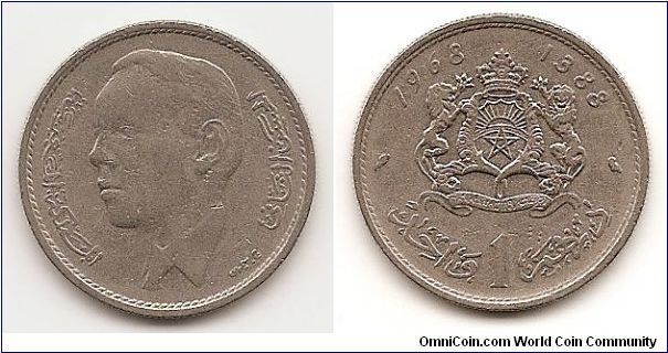 1 Dirham
Y#56
Nickel, 23.6 mm. Obv: Head left Rev: Crowned arms with
supporters