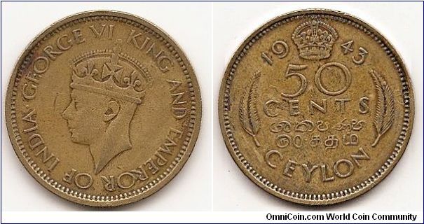 Ceylon 50 Cents
KM#116
5.5400 g., Nickel-Brass Ruler: George VI Obv: Crowned head
left Rev: Crown divides date above denomination Note: Frozen
date 1943, restruck until 1951.