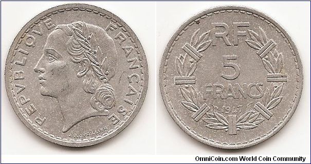 5 Francs
KM#888b.1
Aluminum, 31 mm. Obv: Laureate head left Rev: Denomination
above date within sectioned wreath