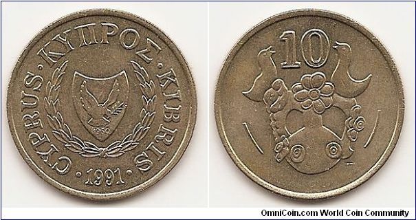 10 Cents
KM#56.3
5.5700 g., Nickel-Brass, 24.4 mm. Obv: Altered wreath around
arms Rev: Decorative vase, denomination above