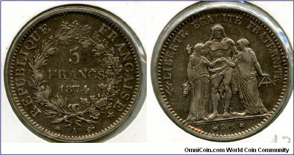 1874a 5F
Third Republic 1871 1940
Hercules flanked by allegorical figures of Liberty and Equality on whose shoulders he rests his hands in a fraternal embrace).
A = Paris Mint mark