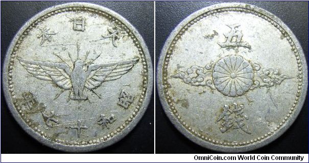 Japan 1942 5 sen. 1.0g. Interesting planchet flaws.