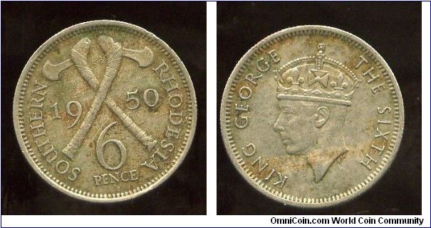 Southern Rhodesia 
1950
6d Sixpence
Crossed Ax's above value
King George VI