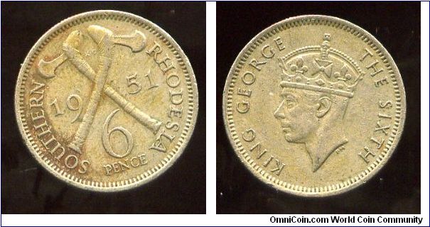 Southern Rhodesia 
1951
6d Sixpence
Crossed Ax's above value
King George VI