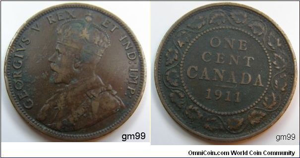 Large One Penny
Obverse;King George V left. Reverse; Denomination above date within beaded circle, chain of leaves surrounds. Edge; Plain. Bronze, One cent.