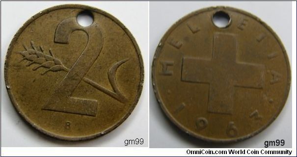 2 Rappen (Bronze) Obverse; Cross with legend around
HELVETIA date 1963
Reverse; Value with single plant stalk behind 2