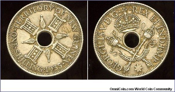 New Guinea
1935
1/- One Shilling
Native symbols
Crown over crossed septers