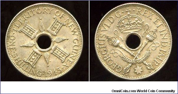 New Guinea
1945
1/- One Shilling
Native symbols
Crown over crossed septers