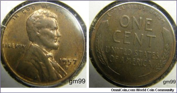 The Bottom Half of the B in Liberty is filled in, The first 9 in 1957 is filled 
Bronze
1957D Wheat Penny