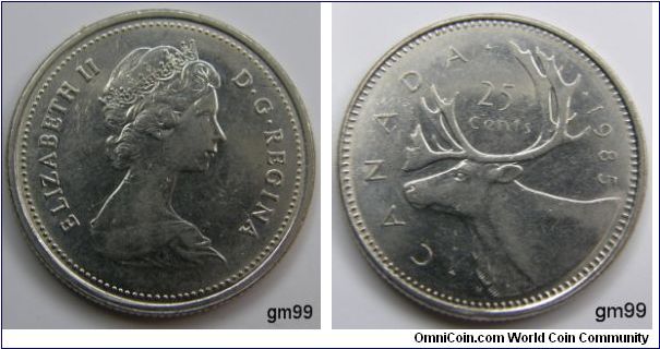 Obverse; Young Queen Elizabeth II right. Reverse. Caribou left, denomination above, date ate right. Composition: Nickel.
25 Cents