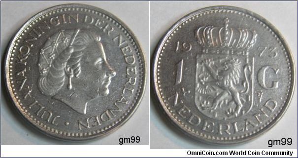1 Gulden (Nickel) Obverse; Queen Juliana right,
JULIANA KONINGIN DER NEDERLANDEN
Revese; Crowned arms, Lion rampant left holding sword,
date 1973, 1 G NEDERLAND