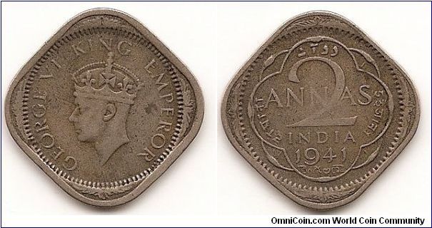 2 Annas-India-British
KM#541
5.8400 g., Copper-Nickel, 25 mm. Ruler: George VI Obv: Second
head, low relief, large crown Obv. Leg.: GEORGE VI KING
EMPEROR Rev: Denomination and date within decorative outlines