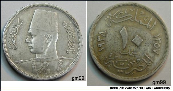 Obverse: Head of King Farouk I left, wearing dress military jacket,
Arabic script before and behind bust
Reverse: Script and date in arabic around arabic number 5 and denomination,
date AD 5 denomination in arabic date AH, script above and below