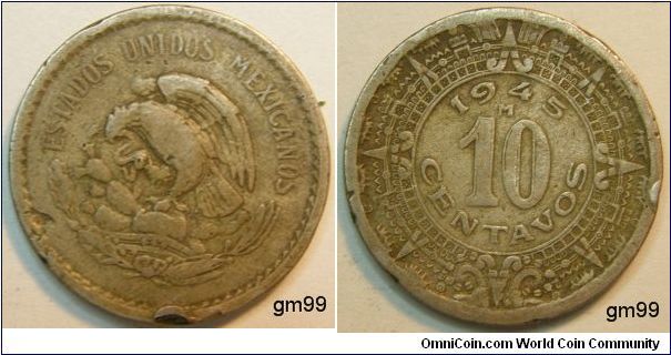 Reverse:Eagle standing left on cactus, snake in beak,
ESTADOS UNIDOS MEXICANOS
Reverse: Date and value within Aztec border,
date 10 CENTAVOS