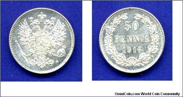 50 pennia.
Nicolaus II (1894-1917).
Grand Duchy of Finland.


Ag750f. 2,55gr.