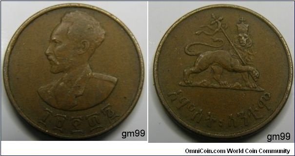 5 Cents (1944).crowned rampant lion holding a cross. Copper