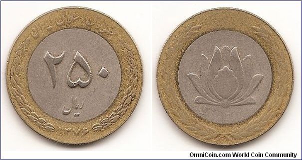 250 Rials
KM#1262
Bi-Metallic Copper-Nickel center in Brass ring, 28 mm. Obv:
Value within circle, inscription and date divide wreath Rev:
Stylized flower within circle and wreath