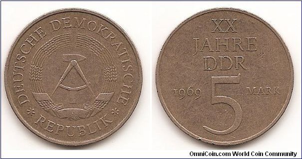 5 Mark - DEMOKRATIC REPUBLIC - 
KM#22.1
Nickel-Bronze, 29 mm. Subject: 20th Anniversary D.D.R Obv:
State emblem Rev: Denomination, date at left