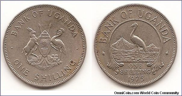 1 Shilling
KM#5
Copper-Nickel Obv: National arms Rev: East African crowned
crane within circular sprig above date and value