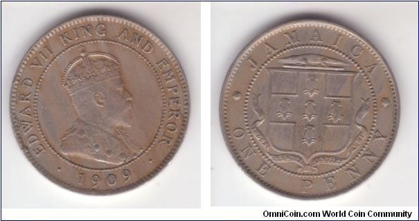 KM-23, another 1909 Jamaican penny; given for comaprison with the previous sample; clearly more wear as can be seen on the pearls in the crown on obverse yet the reverse flowers and the details of the King's dress are more detailed; although I give it extra fine grading it is on he weaker side of it.