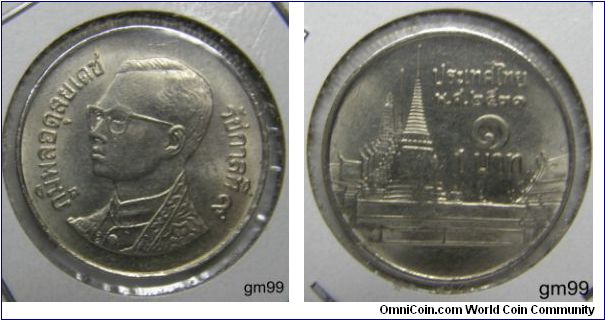 1 Baht (Bronze) : 
Obverse; Bare head of King Bhumiphol left, three medals on chest.
Legend before and behind bust
Reverse; Temple,
Legend and denomination