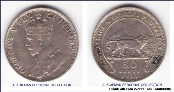 KM-9, 1911 British East Africa 50 cents; silver, reeded edge; about VF condition with a couple of stains on reverse.