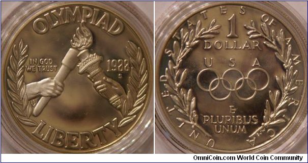 Olympic commemorative silver dollar. 'Liberty's Torch and the Olympic Torch merging in a single flame' (ref US Mint certificate that came with coin), 38 mm