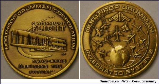 Centennial of flight commemorative coin by the Northrop Grumman aerospace company.  Showing many of the aircraft they have helped produce.  38 mm