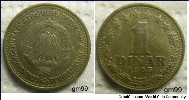 1 Dinar (Copper-Nickel) : 1965
OBVERSE: Six torches in center as one, wheat stalks around and star above, 29.XI.1943 on banner,
 C?P J??OC?AB?JA SFR JUGOSLAVIJA
REVERSE: Value in wreath, six stars above,
1 DINAR 1965
