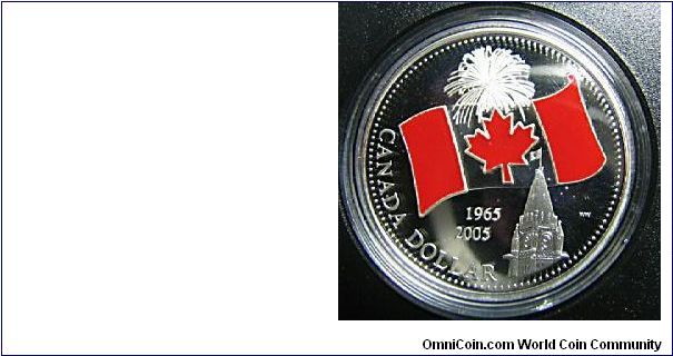 Proof Silver Dollar. Flag with red enamel. Commemorates the 40th anniversary of The Red Maple Leaf as Canada's flag.