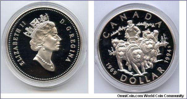 Silver Dollar.
Marks the 25th anniversary of the last dog team patrol of the Royal Canadian Mounted Police.