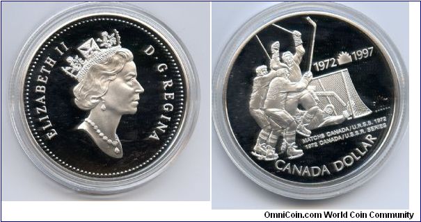 Silver Dollar.
Marks the 25th anniversary of the 1972 Canada/USSR Hockey Series. Reverse features a depiction of 'The Goal' as Team Canada celebrates a dramatic come from behind win in the final game to capture the series title.