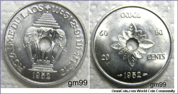 Laos issued its first coins in 1952, when it was gaining independence from France. The coins were issued by the Kingdom of Laos and consisted of the 10, 20 and 50 Cents struck in aluminum at the Paris Mint. All three coins were struck with a center hole to allow for the coins to be easily strung and carried. It appears the hole was an afterthought in the design process as it pierces the center of the design, rather than incorporating the hole into an artistic design.