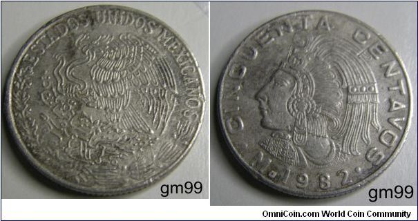 50 Centavos (Copper-Nickel) 
Obverse: Eagle standing left on cactus, snake in beak, ESTADOS UNIDOS MEXICANOS
Reverse: Figure in Aztec headdress left CINCUENTA CENTAVOS Mo date