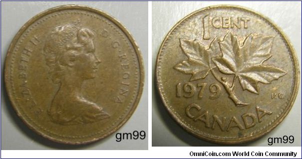 One Cent (Bronze) : 1979
Obverse: Crowned head of Queen Elizabeth II right,
ELIZABETH II D G REGINA
Reverse: Maple leaves,
1 CENT date CANADA