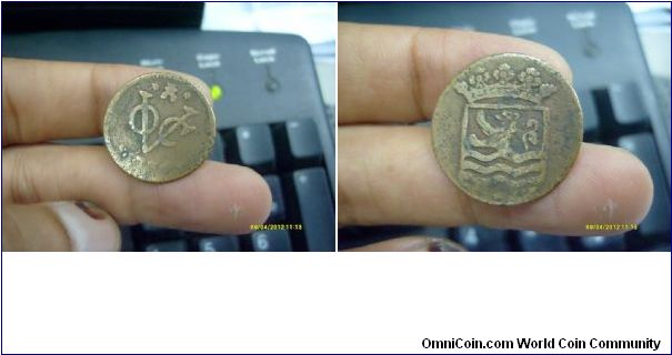 VOC copper Duit
Mint : Zeeland ( 1726-1793 AD
Obverse : Voc Monogram
Reverse : Lion lft swimming in water