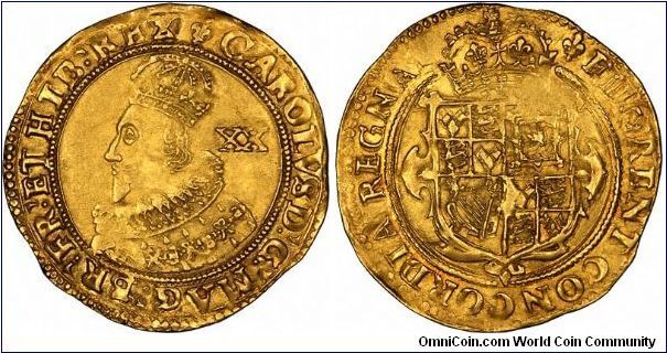 First bust of Charles I, with mintmark fleur de lys, date this gold Unite to 1625. Reverse legend 
FLORENT CONCORDIA REGNA, meaning 'Kingdoms flourish through concord'.
The XX to the right of the portrait denotes this as a 20 shilling coin.