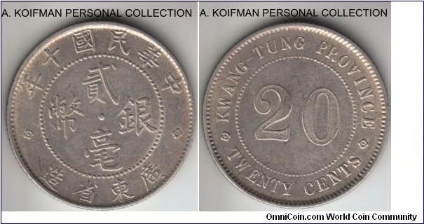Y#423, Year 10 (1921) China Kwangtung province 20 cents; silver, reeded edge; good extra fine or so, seems to be a standard issue with the dot at the obverse center and two rosettes.