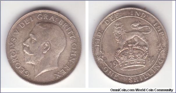 KM-816, Great Britain 1911 shilling; hollow neck variety, I ran across reference to Davis 1971, despite unattarctive toning about extra fine coin for wear or even full extra fine