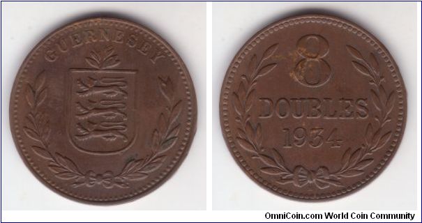 KM-14, 1934 Heaton mint Guernsey 8 doubles; very fine for wear but some verdigris and rim bumps.